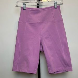 Girlfriend Collective women’s “High-Rise Bike Short”, color “Snapdragon”, size S